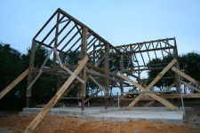 Note the steel leg extensions used to raise the barn up three feet.  These were later wrapped with stone.