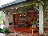 Heritage Restorations used reclaimed hand hewn timbers and traditional timber frame joinery to build the exterior porch.